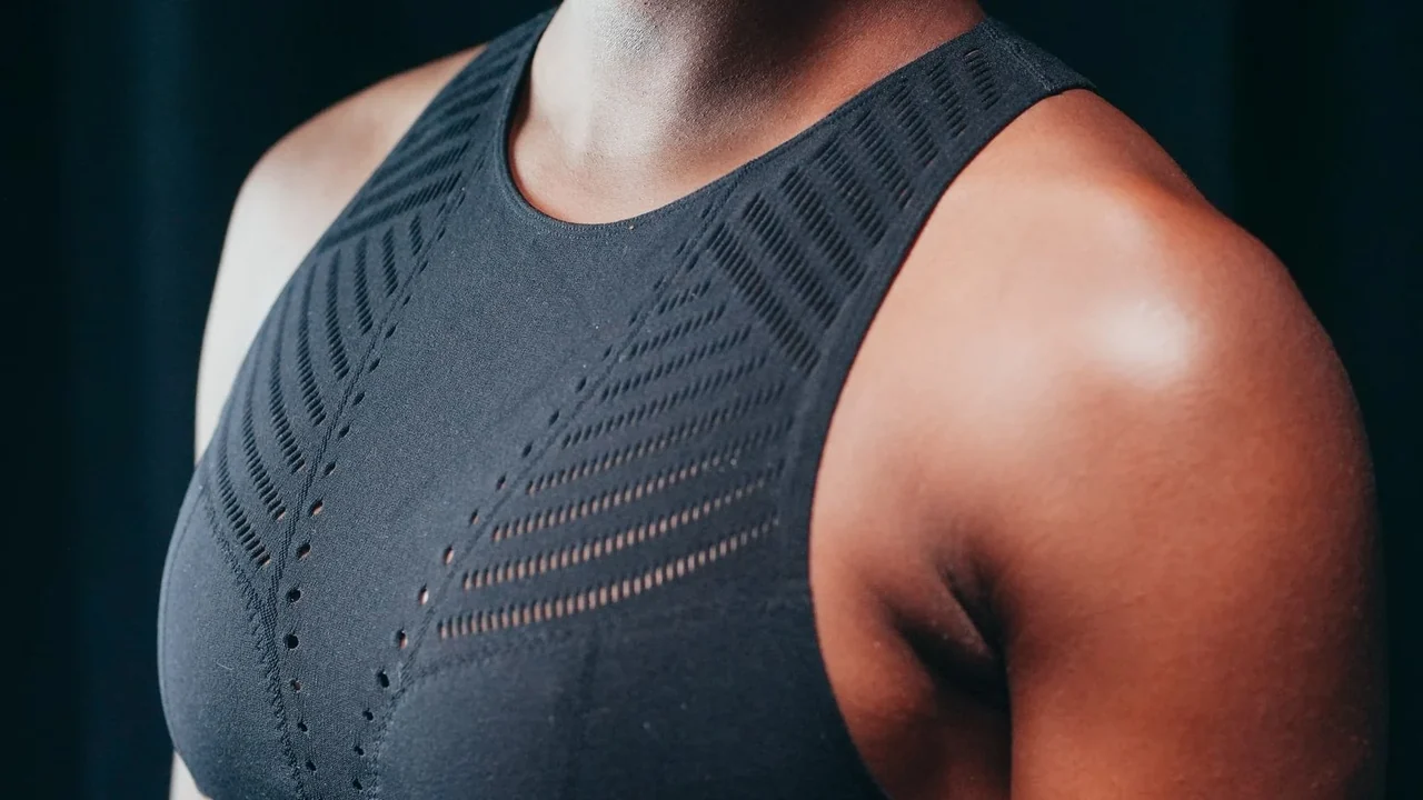A close view of a dark textured sports top